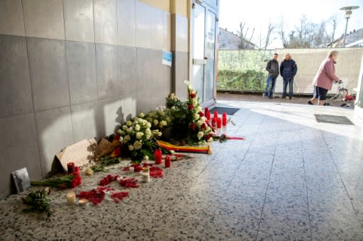 A day after nine people were killed by a gunman with "a very deeply racist attitude," Germany's interior minister warned that the far right still posed a "very high" security threat