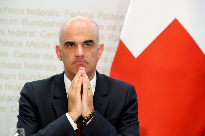 Swiss Interior Minister Alain Berset, Swiss President Simonetta Sommaruga and Swiss Economic Minister Guy Parmelin hold a news conference, in Bern