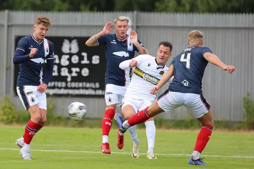 Dumbarton 2-3 Falkirk (29 June 2024, Friendly): Kalvin Orsi takes on three defenders