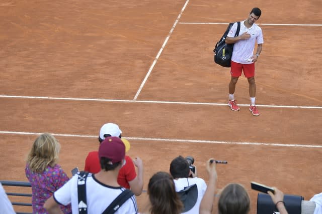 A crowd of 1,000 watched Novak Djokovic secure a spot in the final of the Italian Open, but Rafael Nadal was dumped out of the tournament in the quarter-final stage