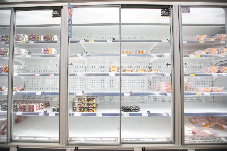 Empty shelves are seen in the meat aisle of Co-Op supermarket, Harpenden, Britain, September 22, 2021.  REUTERS/Peter Cziborra