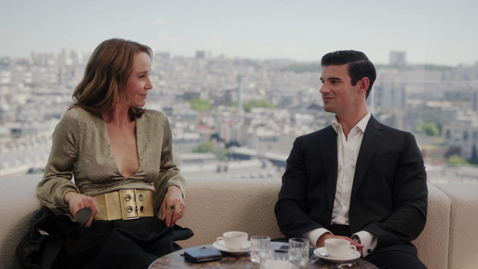 Emily in Paris. (L to R) Philippine Leroy-Beaulieu as Sylvie Grateau, Paul Forman as Nicolas De Leon in episode 302 of Emily in Paris. Cr. Courtesy of Netflix © 2022