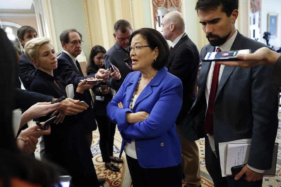 Sen. Mazie Hirono, D-Hawaii, speaks to members of the media on Capitol Hill in Washington, Tuesday, Sept. 18, 2018. (AP Photo/Pablo Martinez Monsivais)