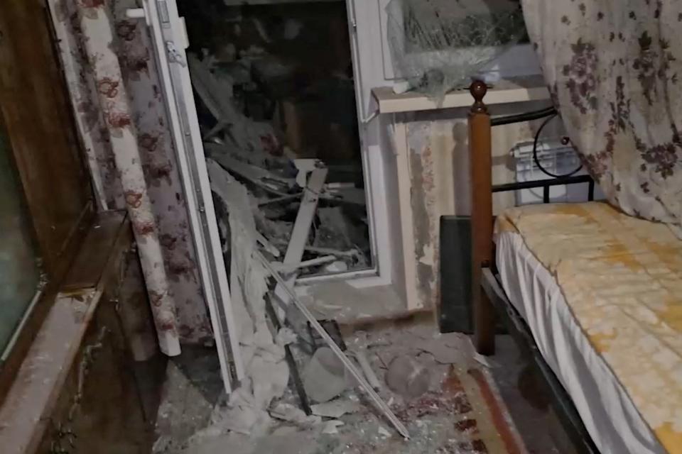 Debris is scattered inside an apartment after shelling in a residential block in Kherson that killed at least one and wounded seven others (via REUTERS)