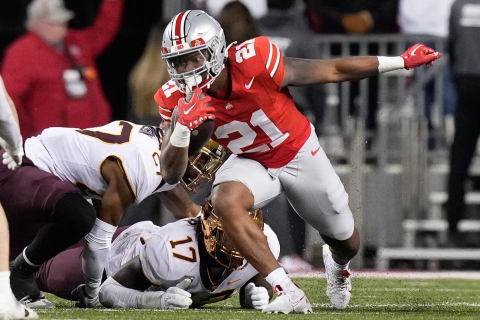 Nov 18, 2023; Columbus, Ohio, USA; Ohio State Buckeyes running back Evan Pryor (21) runs during the second half of the NCAA football game against the Minnesota Golden Gophers at Ohio Stadium. Ohio State won 37-3.