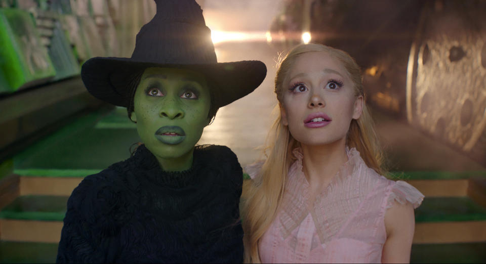 This image released by Universal Pictures shows Cynthia Erivo, left, and Ariana Grande in a scene from the film "Wicked." (Universal Pictures via AP)