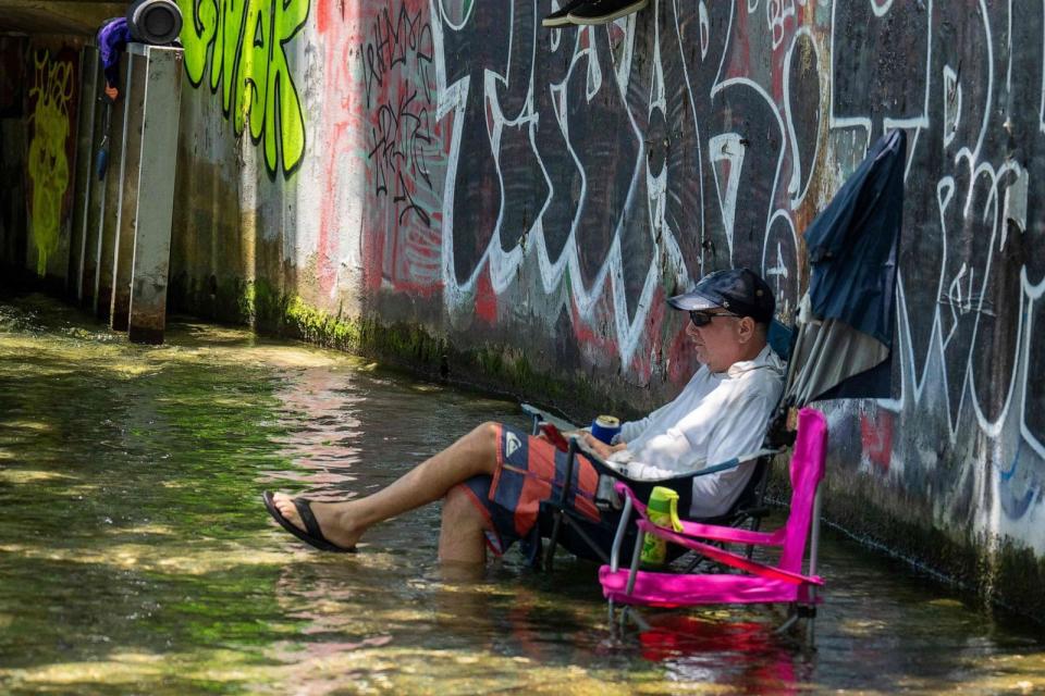 PHOTO: Residents cool off at Barton Creek on June 27, 2023 in Austin, Texas. (Suzanne Cordeiro/AFP via Getty Images)