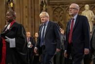 British PM Johnson and opposition Labour leader Corbyn head to parliament in London