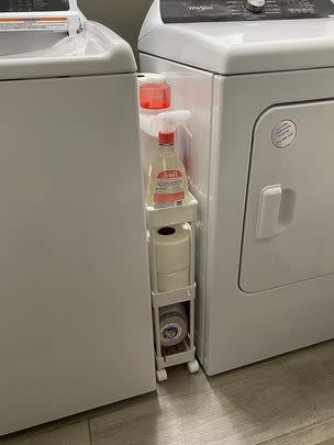 A narrow three-tier rolling cart that nests neatly between your washer and dryer