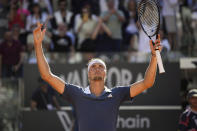 Germany's Alexander Zverev celebrates winning a set against Chile's Alejandro Tabilo during a men's tennis semifinal match at the Italian Open tennis tournament, in Rome, Friday, May 17, 2024. (AP Photo/Andrew Medichini)