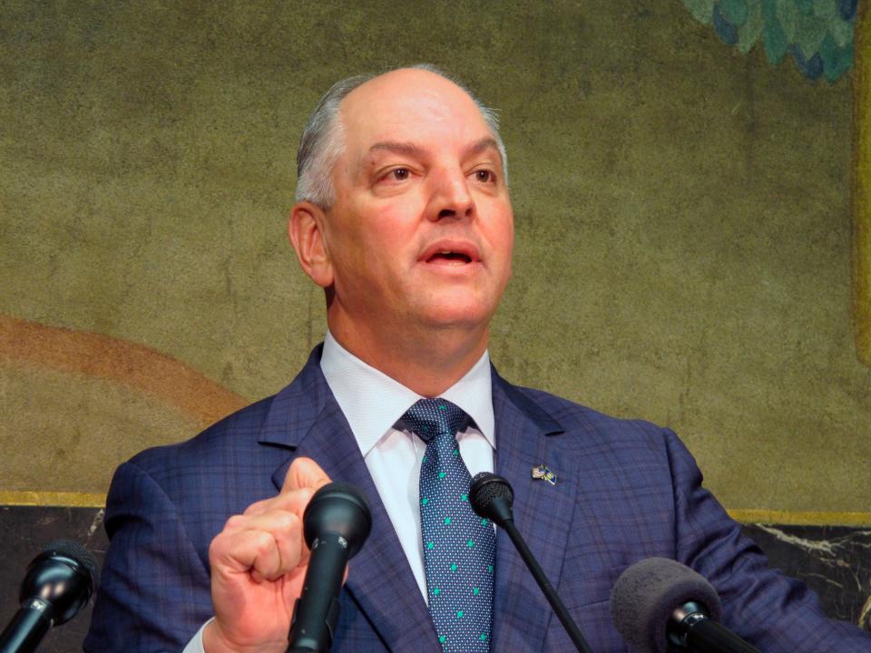 In this Thursday, Sept. 20, 2018 file photo, Gov. John Bel Edwards talks about an expected $300 million-plus surplus Louisiana will have from the last budget year in Baton Rouge, La. (AP Photo/Melinda Deslatte, File)