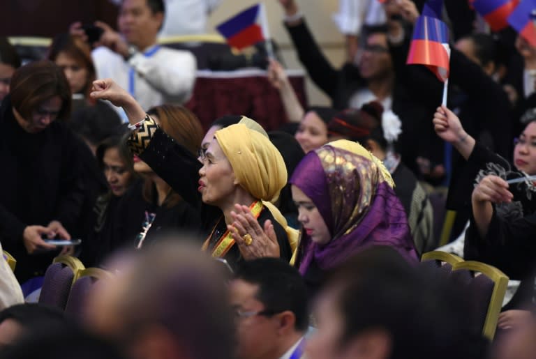 Members of the Filipino community attend a meeting with Philippine President Rodrigo Duterte in the Saudi capital Riyadh, on April 12, 2017