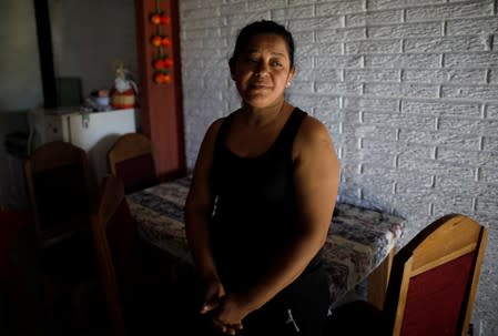 Rosa Ramirez, mother of a migrant who drowned in the Rio Grande River with his daughter during their journey to the U.S., is pictured at her house in the Altavista neighbourhood in San Martin