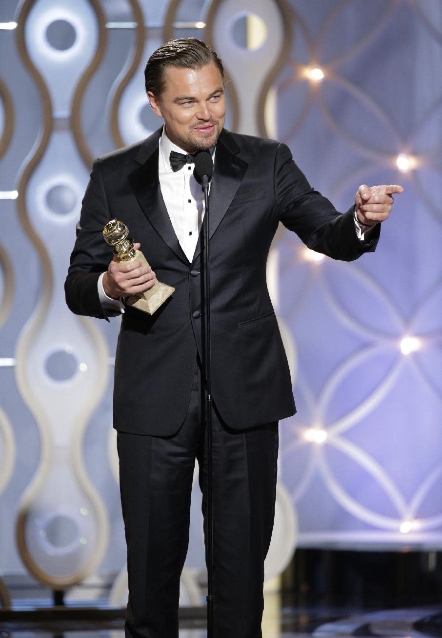 En esta imagen difundida por NBC, Leonardo DiCaprio acepta el Globo de Oro al mejor actor en una película musical o de comedia por su papel en "The Wolf of Wall Street", el domingo 12 de enero del 2014 en el hotel Beverly Hilton en Beverly Hills, California. (AP Foto/NBC, Paul Drinkwater)