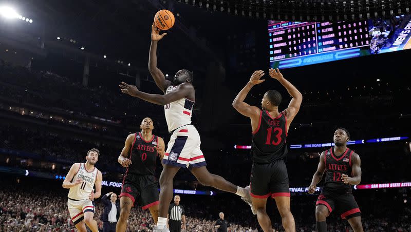 Connecticut forward Adama Sanogo scores during the second half of the men’s national championship college basketball game against San Diego State in the NCAA Tournament on Monday, April 3, 2023, in Houston.