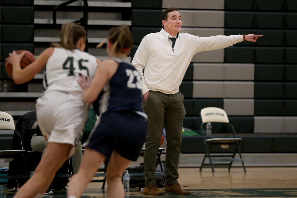 Jimmy Flynn is in his first-year as head coach of the Dover High School girls basketball team. Flynn, who grew up and played high school basketball in Massachusetts, supports the idea of a shot clock in New Hampshire because it forces players to think more and play at a faster pace.