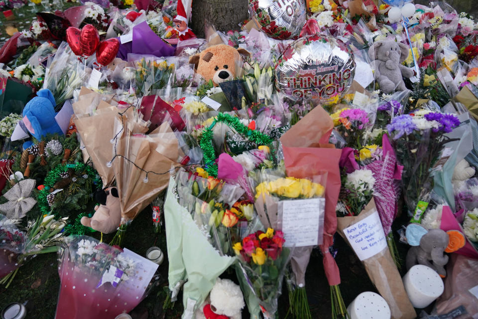 Flowers and tributes near to Babbs Mill Park in Kingshurst, Solihull, after the deaths of three boys aged eight, 10 and 11 who fell through ice into a lake in the West Midlands. Picture date: Tuesday December 13, 2022. (Photo by Jacob King/PA Images via Getty Images)