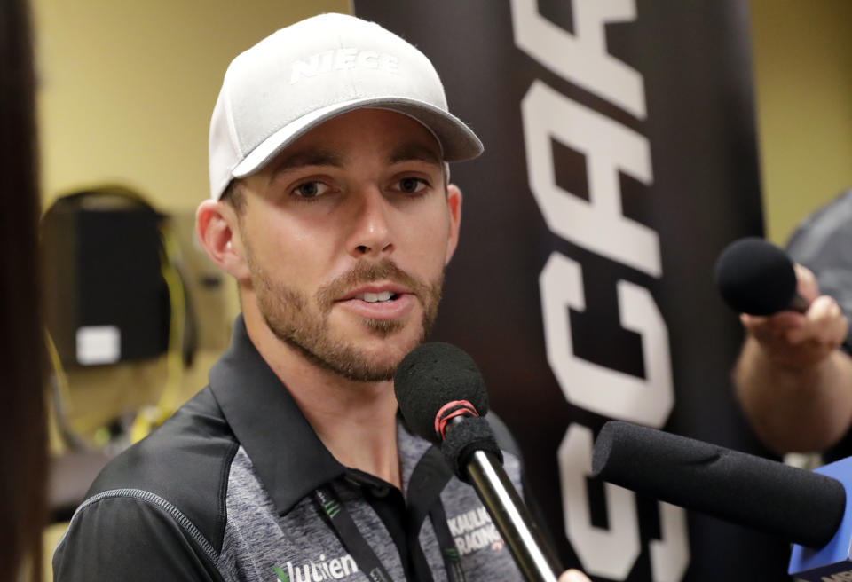 FILE - In this June 28, 2019, file photo, NASCAR Truck Series driver Ross Chastain talks to media at Chicagoland Speedway in Joliet, Ill. The NASCAR Truck Series has its championship race Friday, Nov. 15, 2019, at Homestead-Miami Speedway. Brett Moffitt, Matt Crafton and Stewart Friesen join Ross Chastain in the championship field. Moffitt is the defending series champion and will try to become the first repeat winner since Crafton in 2013 and 2014. (AP Photo/Nam Y. Huh, File)
