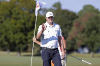 Jason Kokrak waves to the gallery after sinking his putt on the 17th hole during the final round of the Houston Open golf tournament Sunday, Nov. 14, 2021, in Houston. (AP Photo/Michael Wyke)