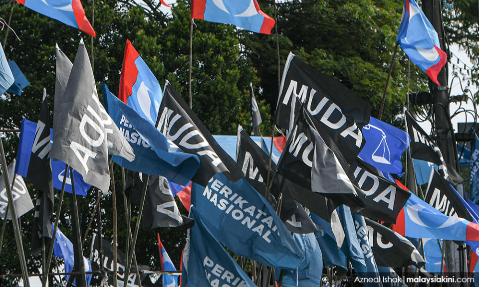 Flags of the parties that are battling in the Johor polls