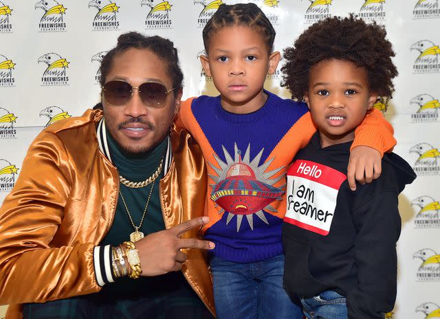 <p>Prince Williams/WireImage</p> Future and his sons Prince Wilburn and Future Zahir Wilburn at the 5th annual FreeWishes Winter Wishland on December 17, 2017 in Atlanta, Georgia.