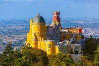 <p>This palace in the Sintra hills, near Portugal's capital Lisbon, is loved for its Moorish style of architecture. It can be seen from any point of Pena park. </p>