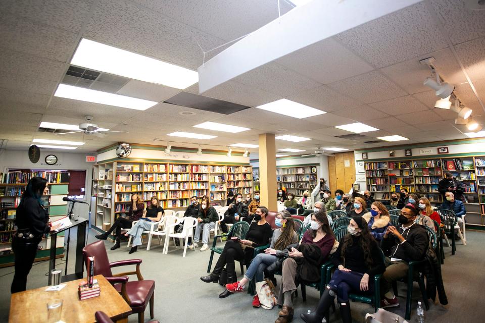 Sasha LaPointe speaks while doing a reading of her book Red Paint during Mission Creek Festival, Thursday, April 7, 2022, at Prairie Lights in Iowa City, Iowa.