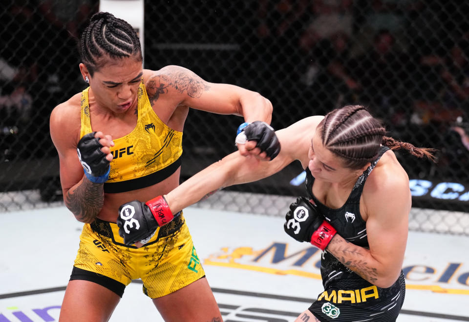 LAS VEGAS, NEVADA – OCTOBER 14: (L-R) Viviane Araujo of Brazil and Jennifer Maia of Brazil trade punches in a flyweight fight during the UFC Fight Night event at UFC APEX on October 14, 2023 in Las Vegas, Nevada. (Photo by Chris Unger/Zuffa LLC via Getty Images)