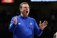 Kansas head coach Bill Self questions a ruling by an official during the first half of an NCAA college basketball game against Central Florida, Wednesday, Jan. 10, 2024, in Orlando, Fla. (AP Photo/John Raoux)