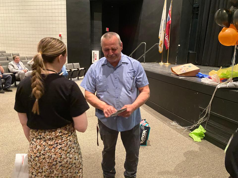 On Wednesday, April 12, 2023, Taunton High School threw a giant retirement party for head custodian Steven Medeiros in the auditorium after school. Scratch and lottery tickets are a personal favorite pastime of Medeiros. The final act of congratulations had every member of faculty and staff in attendance stand in line to give him a scratch ticket.