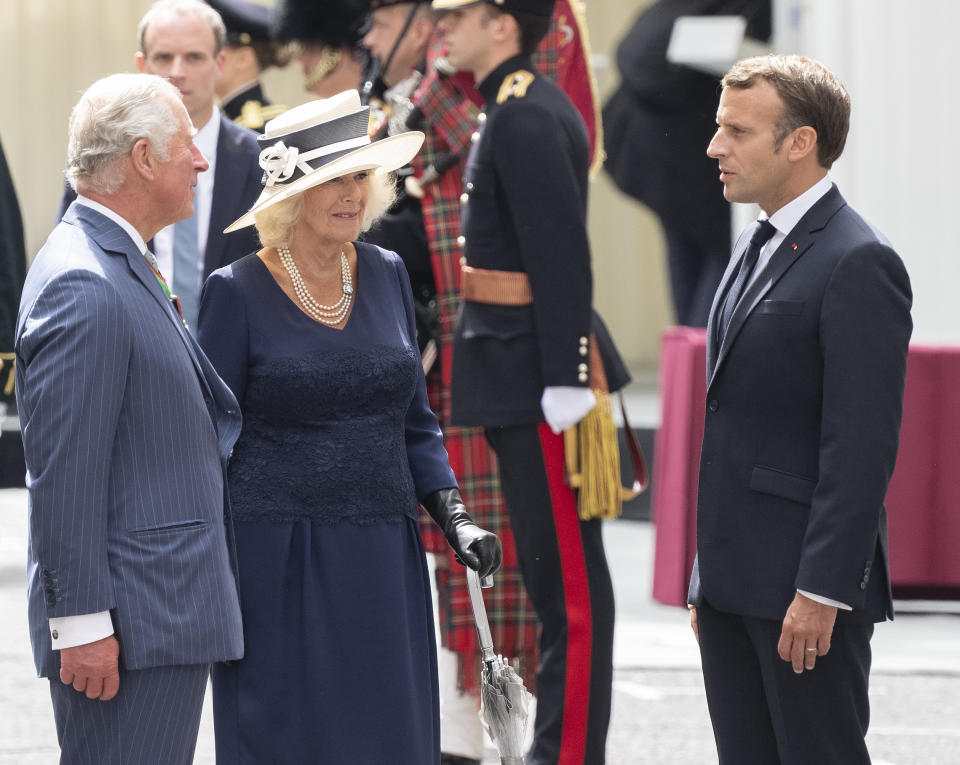 French President Emmanuel Macron meets Prince Charles, Prince of Wales and Camilla, Duchess of Cornwall during a ceremony at Carlton Gardens. The French president is visiting London on June 18, 2020 to commemorate the 80th anniversary of Charles de Gaulle's BBC broadcast to occupied France following the Nazi invasion in 1940 "Appel" .