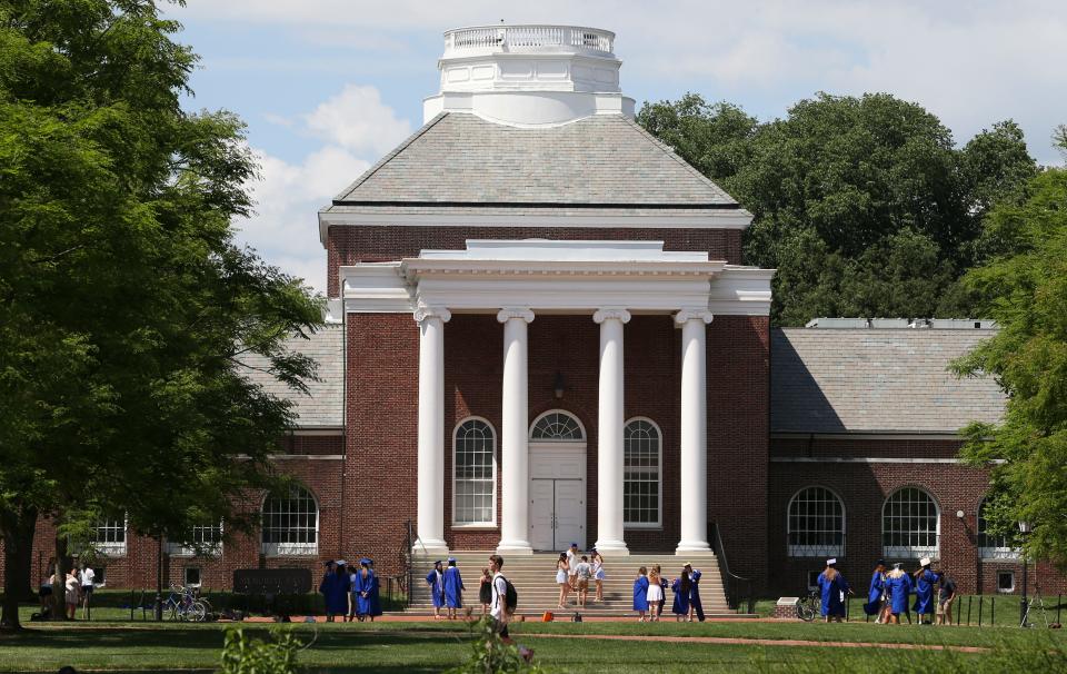 Graduates gather at Memorial Hall for photos ahead of graduation ceremonies in 2018.