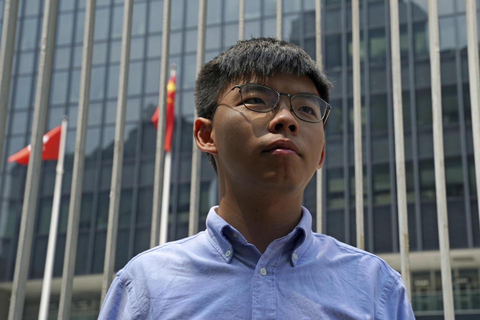 Hong Kong democratic activist Joshua Wong speaks to the media in Hong Kong, Saturday, Sept. 28, 2019. Wong announced plans to contest local elections and warns that any attempt to disqualify him will only spur more support for monthslong pro-democracy protests. (AP Photo/Kin Cheung)