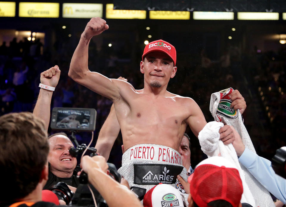 CARSON, CA - SEPTEMBER 09:  Juan Francisco Estrada of Mexico celebrates his victory over Carlos Cuadras of Mexico at StubHub Center on September 9, 2017 in Carson, California.  (Photo by Jeff Gross/Getty Images)