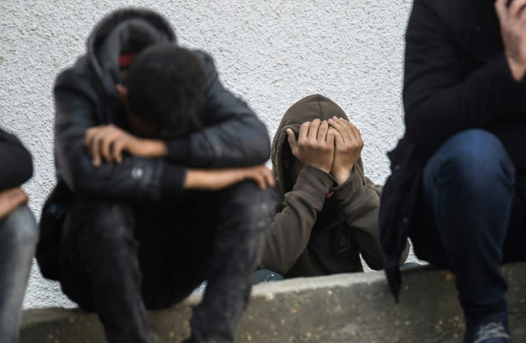 Palestinian relatives of Salam Sabah and Abdullah Abu Sheikha, both 17, mourn during their funeral in Rafah in the southern Gaza Strip, on February 18, 2018