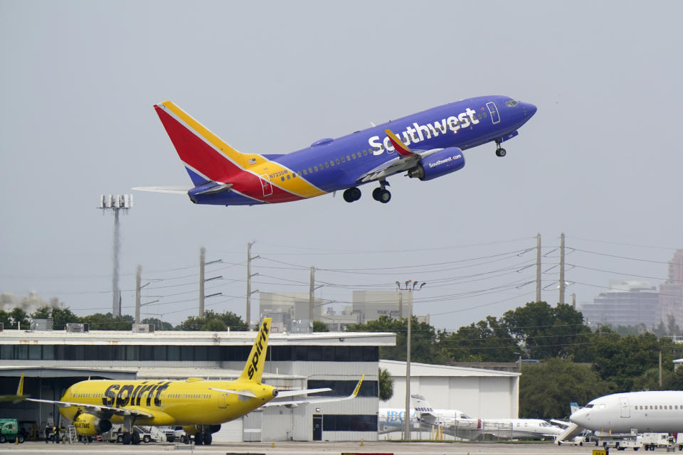 A Southwest Airlines Boeing 737-7H4 takes off, Tuesday, Oct. 20, 2020, from Fort Lauderdale-Hollywood International Airport in Fort Lauderdale, Fla. Airlines are continuing to pile up billions of dollars in losses as the pandemic causes a massive drop in air travel. Southwest Airlines on Thursday, Oct. 22, lost $1.16 billion in the normally strong third quarter, which includes most of the summer vacation season.(AP Photo/Wilfredo Lee)