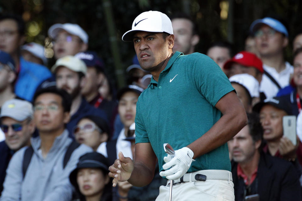 Tony Finau of the United States reacts after tee off in the final round of the HSBC Champions golf tournament held at the Sheshan International Golf Club in Shanghai, Sunday, Oct. 28, 2018. (AP Photo/Ng Han Guan)