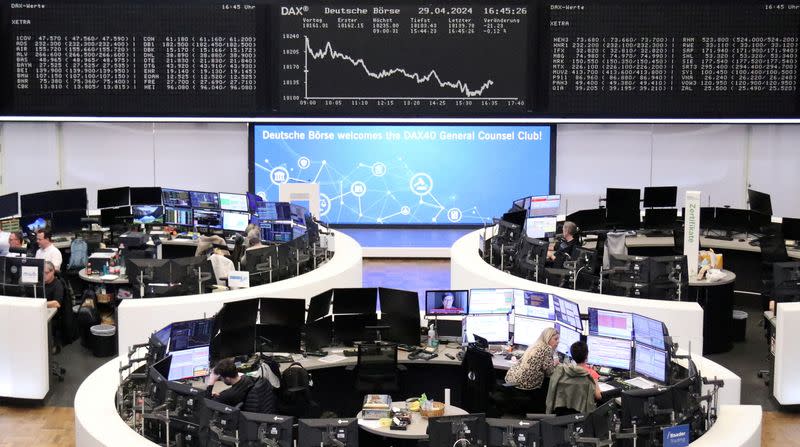FILE PHOTO: German share price index DAX graph is pictured at the stock exchange in Frankfurt, Germany