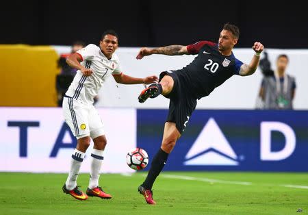 Jun 25, 2016; Glendale, AZ, USA; United States defender Geoff Cameron (20) controls the ball against Colombia forward Carlos Bacca (7) in the first half during the third place match of the 2016 Copa America Centenario soccer tournament at University of Phoenix Stadium. Mandatory Credit: Mark J. Rebilas-USA TODAY Sports