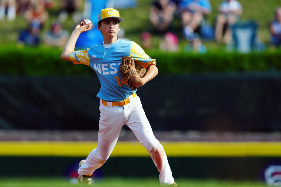 WILLIAMSPORT, PA – AUGUST 27: Brody Brooks #14 of the West Region team from El Segundo, Calif., throws to first base for the out during the Little League World Series Championship Game against the Caribbean Region team from Willemstad, Curacao, at the Little League World Series Complex on Sunday, August 27, 2023 in Williamsport, Pennsylvania. (Photo by Joe Faraoni/MLB Photos via Getty Images)