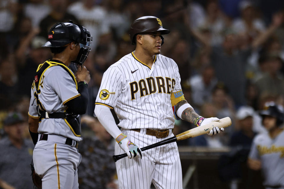 San Diego Padres' Manny Machado looks toward the mound after being hit by a pitch from Pittsburgh Pirates' Angel Perdomo during the seventh inning of a baseball game Tuesday, July 25, 2023, in San Diego. (AP Photo/Derrick Tuskan)
