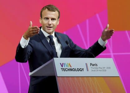 File Photo: French President Emmanuel Macron speaks to participants at the Viva Tech start-up techonology summit in Paris, France, May 24, 2018.    Michel Euler/Pool via Reuters