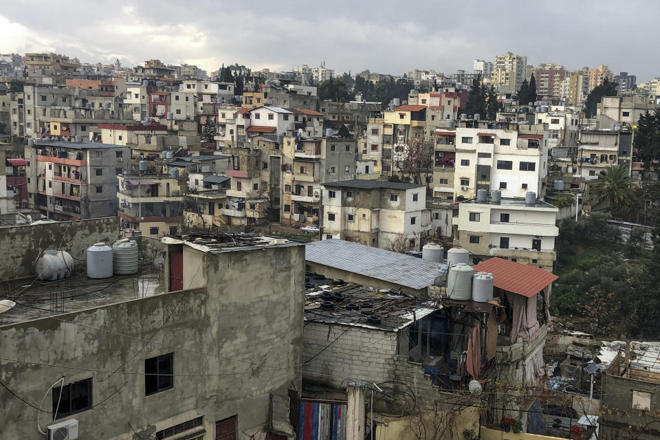 An overview of the village of Wadi Nahleh, the hometown of several Lebanese citizens who were killed in Iraq over the weekend, Lebanon, Wednesday, Feb. 2, 2022. As Lebanon slid deeper into economic misery over recent months, dozens of young men have disappeared from the country’s marginalized north and later surfaced in Iraq, where they are believed to have joined the Islamic State group. The migration has stoked fears of a new wave of radical recruitment, taking advantage of frustration and despair fueled by the economic meltdown and sectarian tensions. (AP Photo/Bassem Mroue)