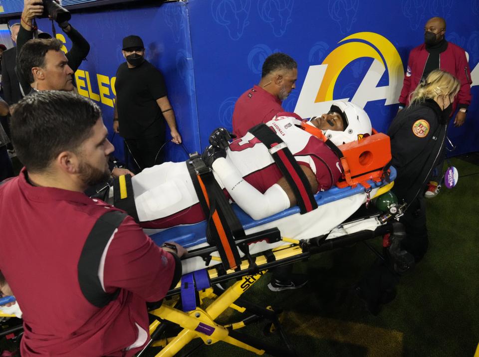 Jan 17, 2022; Los Angeles, California, USA;  Arizona Cardinals safety Budda Baker (3) is taken off the field by stretcher after an injury against the Los Angeles Rams during the third quarter of the NFC Wild Card playoff game. Mandatory Credit: Michael Chow-Arizona Republic