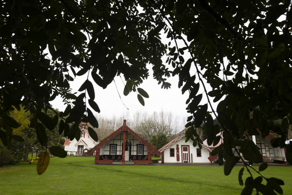 The Otukopiri marae (meeting grounds) stands on the banks of the Whanganui River in the town of Koriniti, New Zealand, on June 17, 2022. Jula Teki, known as "Aunty Sugar," who runs the marae says, “They call us the river rats. And we are the river people, the people of the river. ... When the river is flowing good, everything is okay. When it's flooded, we just all hunker down and we know how the river’s going to react. The road’s probably going to close down, but that doesn’t mean anything to us.” (AP Photo/Brett Phibbs)