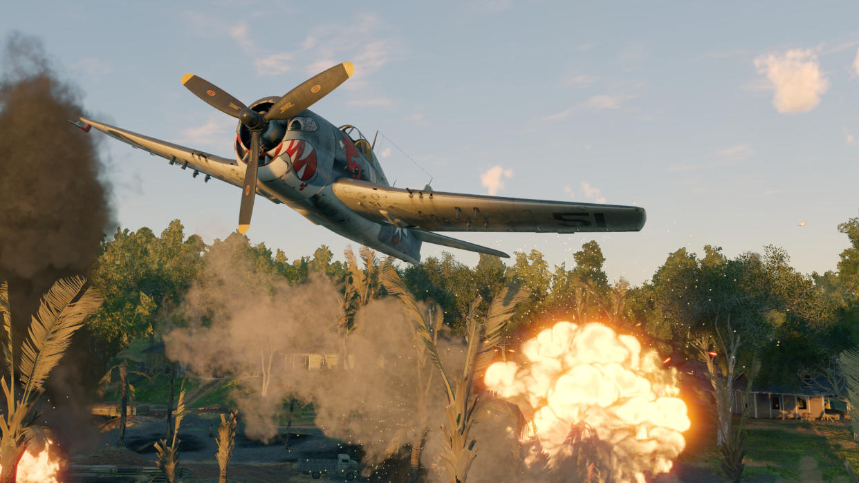  Enlisted: Reinforced screenshot - F6F Hellcat fighter bombing a battlefield from low altitude. 