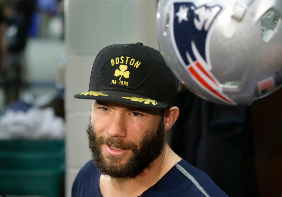 FILE - In this Nov. 16, 2016, file photo, New England Patriots wide receiver Julian Edelman speaks with reporters in the team's locker room before an NFL football team practice in Foxborough, Mass. Citing a knee injury that cut his 2020 season short after just six games, Edelman announced Monday, April 12, 2021, that he is retiring from the NFL after 11 seasons. (AP Photo/Steven Senne, File)