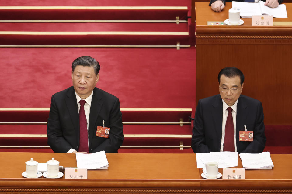 BEIJING, CHINA - MARCH 05: Chinese President Xi Jinping (L) and  Premier Li Keqiang (R) attend the opening of the first session of the 14th National People's Congress at The Great Hall of People on March 5, 2023 in Beijing, China.China's annual political gathering known as the Two Sessions will convene leaders and lawmakers to set the government's agenda for domestic economic and social development for the year. (Photo by Lintao Zhang/Getty Images)