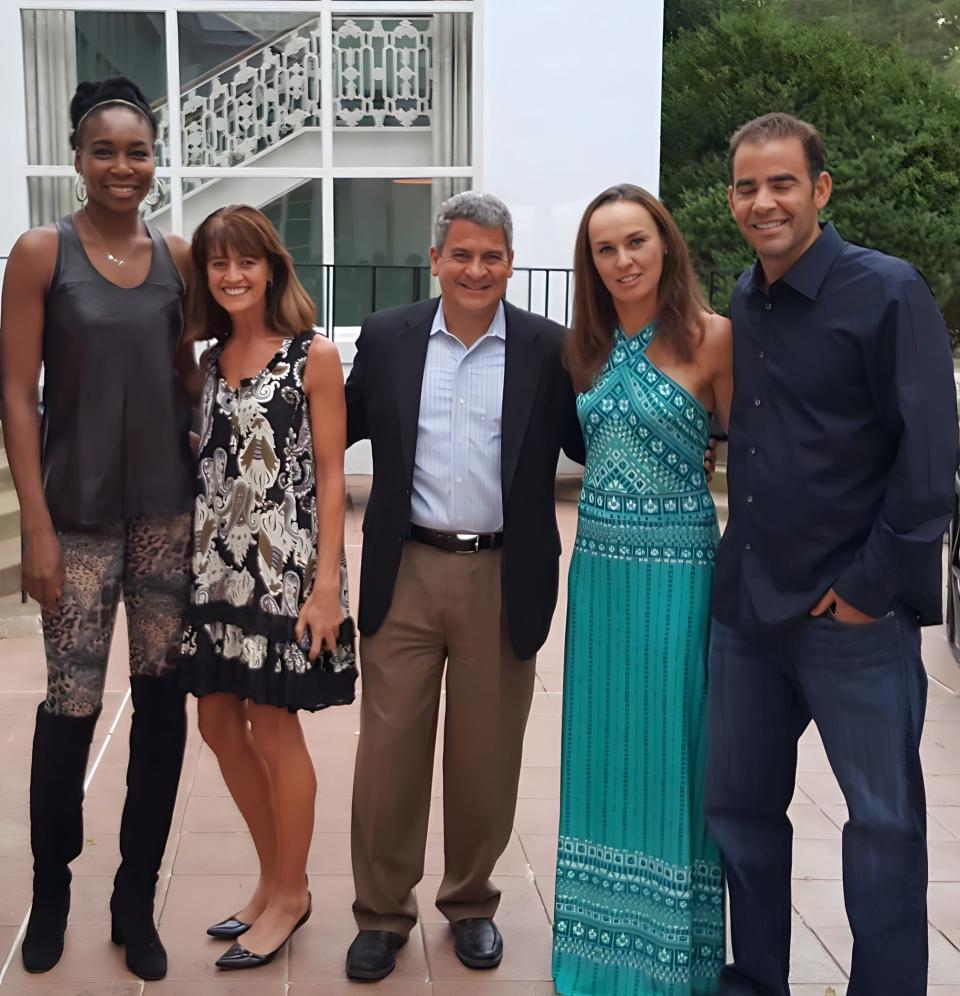 Tammy Simone and her husband Steve with tennis legends (left to right) Venus Williams, Martina Hingis and Pete Sampras during a pro-am celebrity tournament in West Virginia.