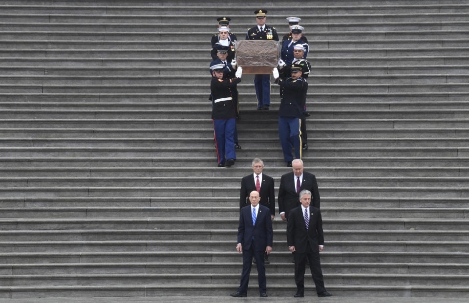 <p>The casket of Rev. Billy Graham is carried down the steps of the U.S. Capitol in Washington, Thursday, March 1, 2018. (Photo: Susan Walsh/AP) </p>